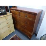 An antique mahogany chest with two short and three long drawers on turned feet, 124cms