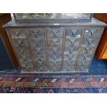 An old oak filing chest having 30 drawers. 86.5cms.