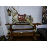 An old wooden rocking horse, probably early 20th Century, 114cms