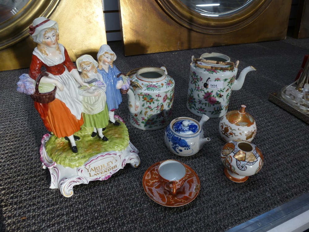 Two crates of teapots, 4 other ornamental items and a figure group.