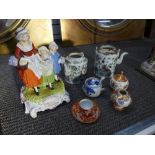 Two crates of teapots, 4 other ornamental items and a figure group.