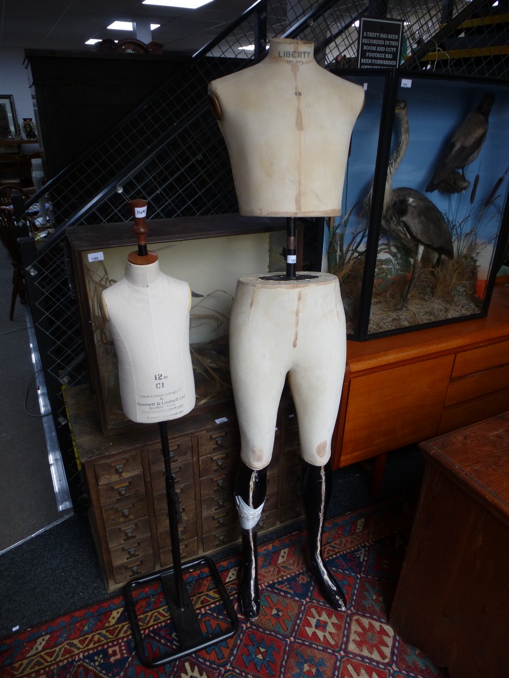 An old 2 piece Haberdashery dummy and a similar childrens dummy by Kennett and Lindsell