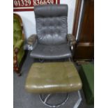 A vintage 1970's leather stressless recliner by Ekornes and matching stool on chrome supports