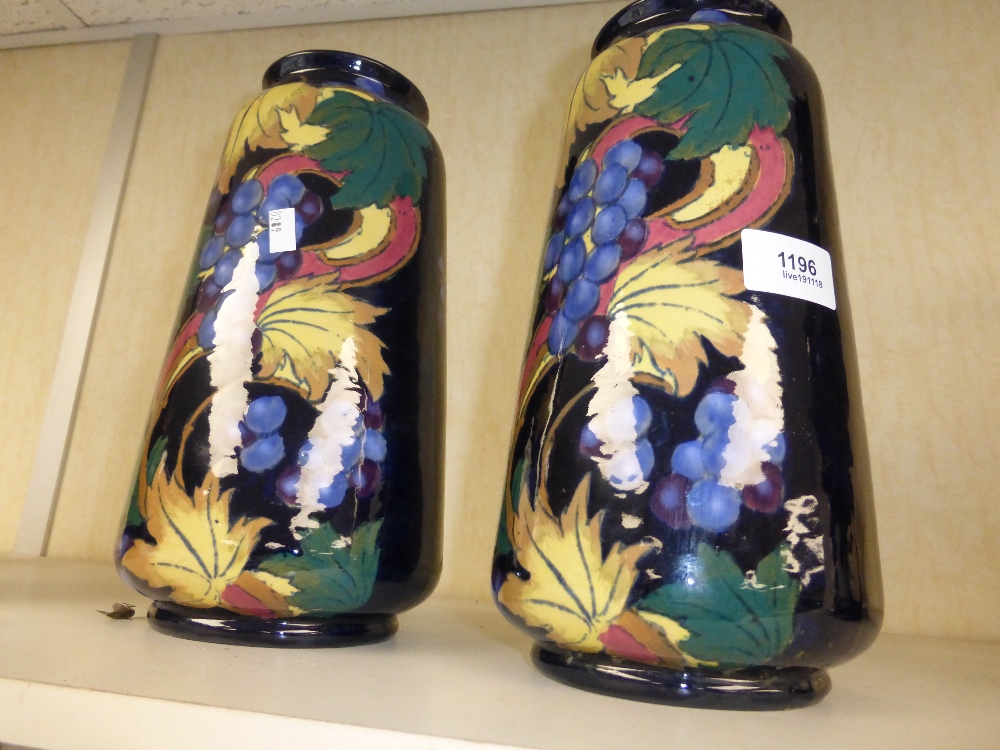 A pair of Roayl Stanley ware vases with grape and vine decoration