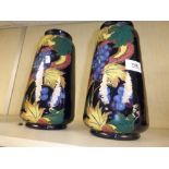 A pair of Roayl Stanley ware vases with grape and vine decoration