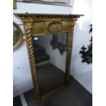 A 19th Century gilt pier mirror with barley twist column sides. 83cms.