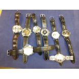 Collection of modern wristwatches mostly with black straps including GOER, Panerai, etc.