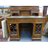 An early 20th century mahogany and inlaid pedestal desk having raised back by Morris & co, 449