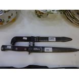 Two bayonets both with steel blades & scabbards, 40 cm