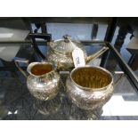Small late Victorian 3 piece tea set with embossed half reeded, flower and leaf decoration,