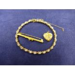 9ct yellow gold bracelet set with white coloured stones stamped 375, 9ct yellow gold bar brooch