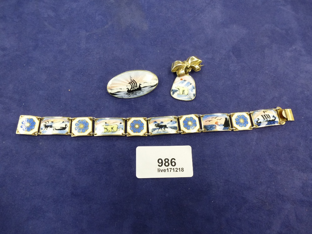 Norwegian enamelled silver bracelet and two matching brooches