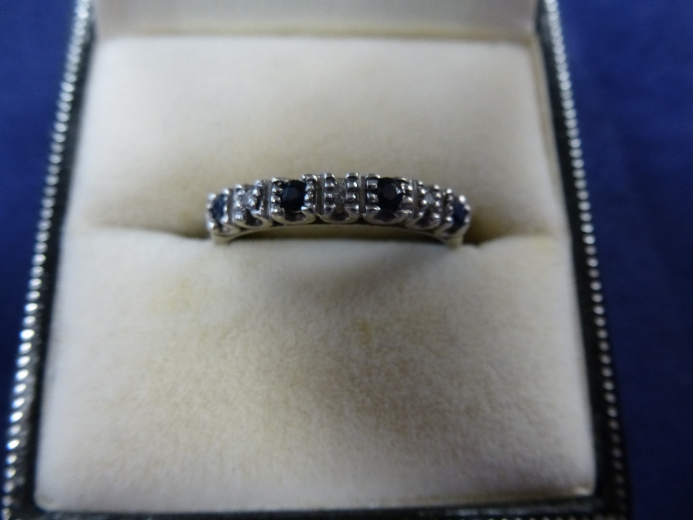 9ct White gold Sapphire/diamond chip ring