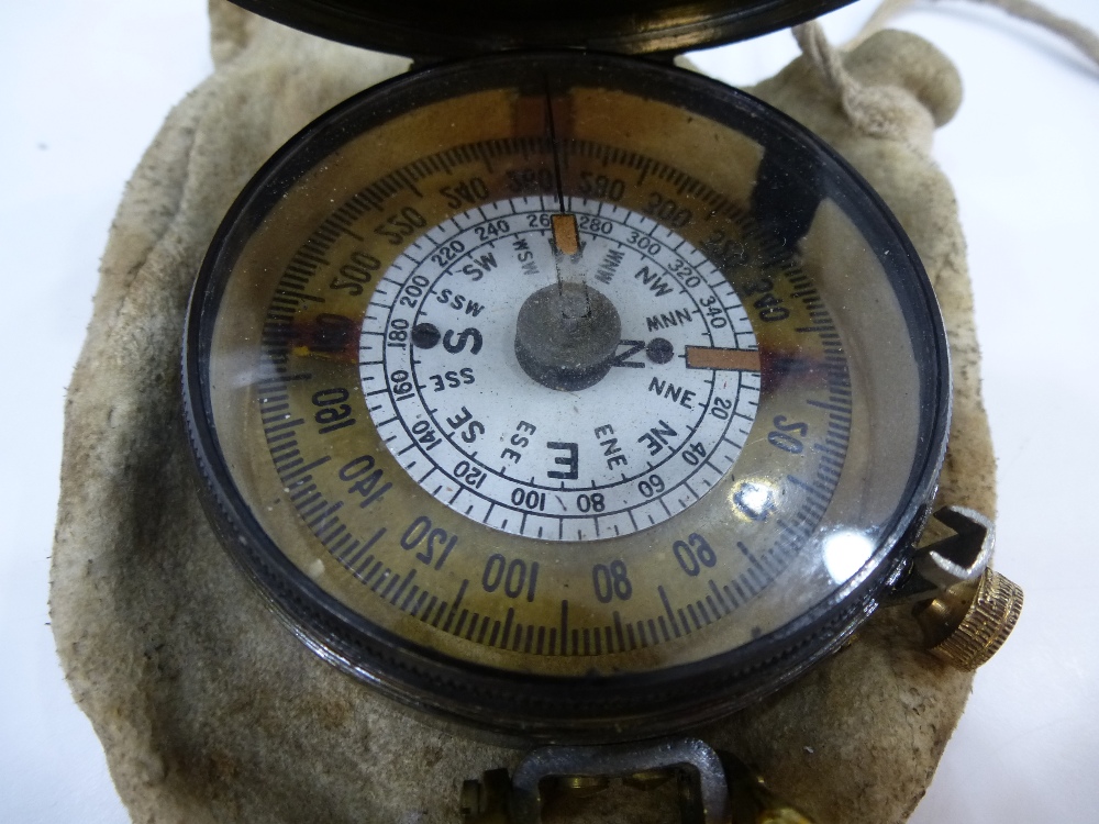 A WWII brass compass and pouch: by S.Mordan & Co., 7497, dated 1918 - Image 2 of 2