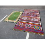 Old geometric kelim rug 300 x 166 and one other smaller rug having green field