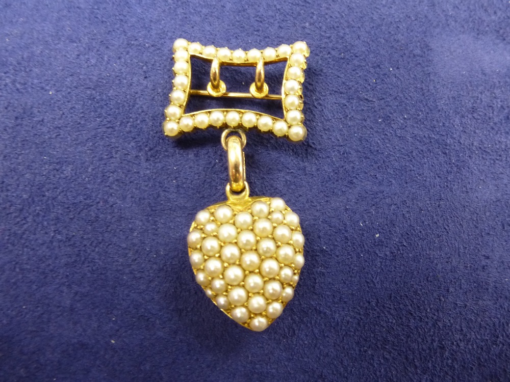 Victorian yellow buckle style brooch set with seed pearls unmarked