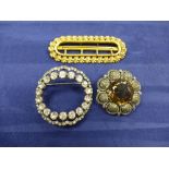 Silver and marcasite brooch with a large smokey quartz, paste brooch and a gilt metal buckle