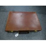 A swaine Adeney Brigg: Tan leather attaché case, brass combination locks hand stitch, suede