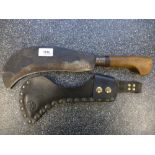 A 1955 Machete by S & J Kitchen: with leather sheath studded to one side