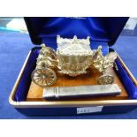 Miniature silver model of a carriage mounted on a mahogany base, Birmingham 1977, maker's mark T.