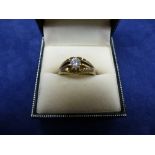 Gent's solitaire diamond ring on a 9ct yellow gold shank, stamped 375, size S