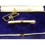9ct gold tie pin with an Amethyst stone in an original box