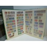 Stamp Album: comprising assorted World and Commonwealth stamps, from Quuen Vicoria to Queen
