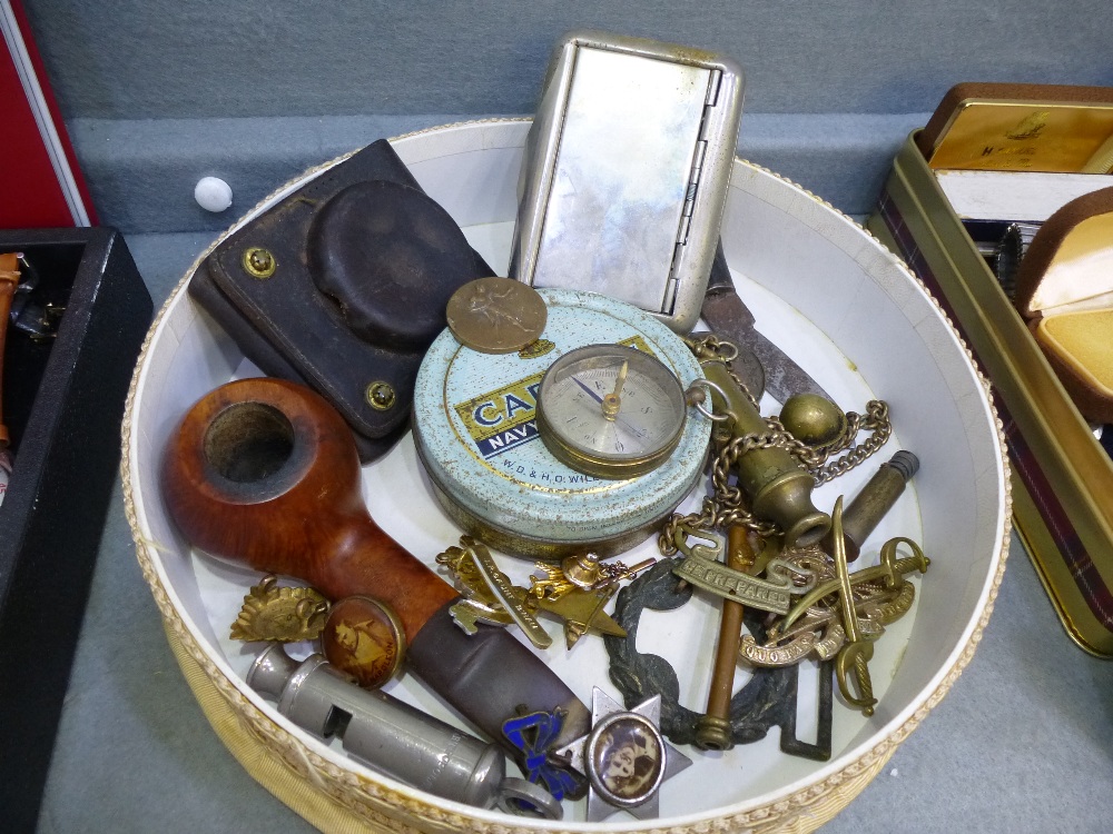 Quantity of miscellaneous items: incl. a compass, various whistle, Military badges, smoking