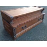 The top & bottom of a globe vernicke type oak bookcase, with dentil moulding and leaf carving.