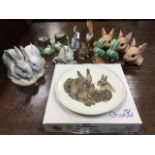 A collection of ceramic rabbits including Spanish porcelain, John Beswick, Lladro, a boxed Goebel