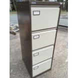 A modern Roneo four-drawer filing cabinet.