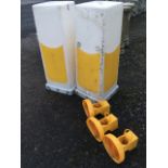 A pair of 3ft square tapering plastic bollards; and three working battery powered warning lights. (