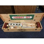A boxed Jaques croquet set made for Harrods, the pine box containing mallets, hoops, balls, etc.