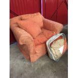 A large upholstered armchair with loose covers (and a spare set), having loose cushions, padded arms