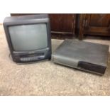 An Orion TV combo with VHS player; and a Toshiba VHS tape player. (2)