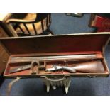 A cased 12 bore side-by-side shotgun by George Graham & Sons, The Strand, London, with 30.25in