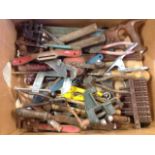 A box of tools - hammers, vices, files, pliers, screwdrivers, clamps, saws, etc. (A lot)