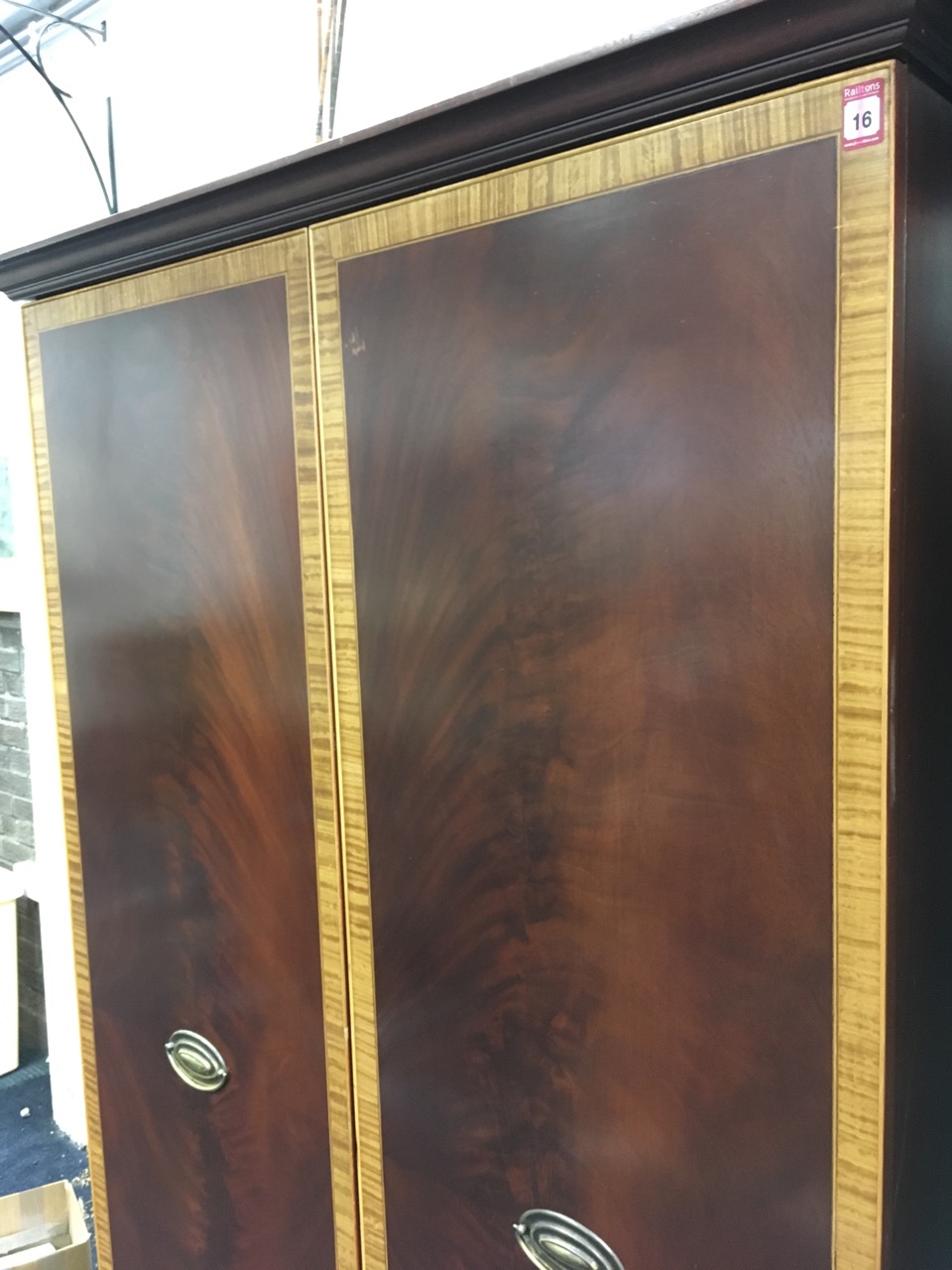 A large mahogany wardrobe with satinwood crossbanded doors enclosing shelves & hanging space, raised - Image 2 of 3