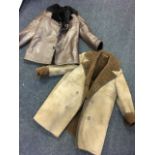 A Kadra brown leather & sheepskin gentlemans coat; and another sheepskin coat. (2)