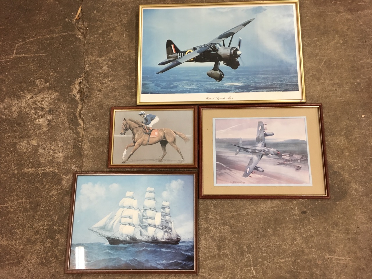 Two framed pictures of aircraft; a Cutty Sark print; and a Lawson-Price print after Bruner. (4)