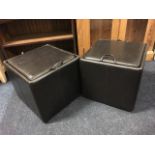 A pair of faux leather pouffe/storage boxes, with handles to lids and internal trays. (2)