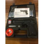 A cased Beretta .177 air pistol, the gun complete with instructions, spare cylinders and