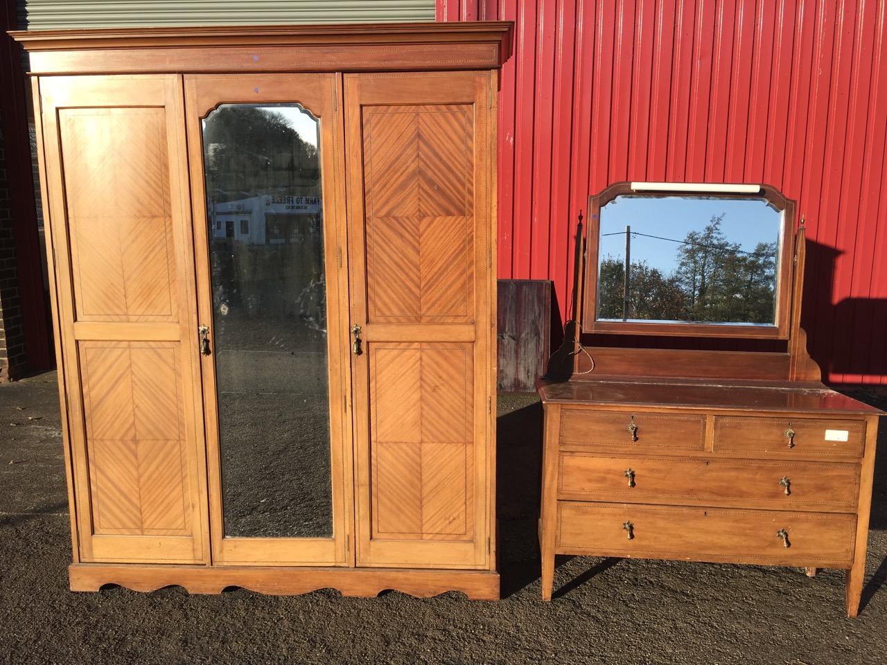 A late Victorian mahogany wardrobe & matching dressing table, the robe with quarter veneered doors