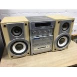 A Panasonic MD stereo system, SA-PM30MD, with twin Bi-Amp super woofer speakers, mini-disc and CD