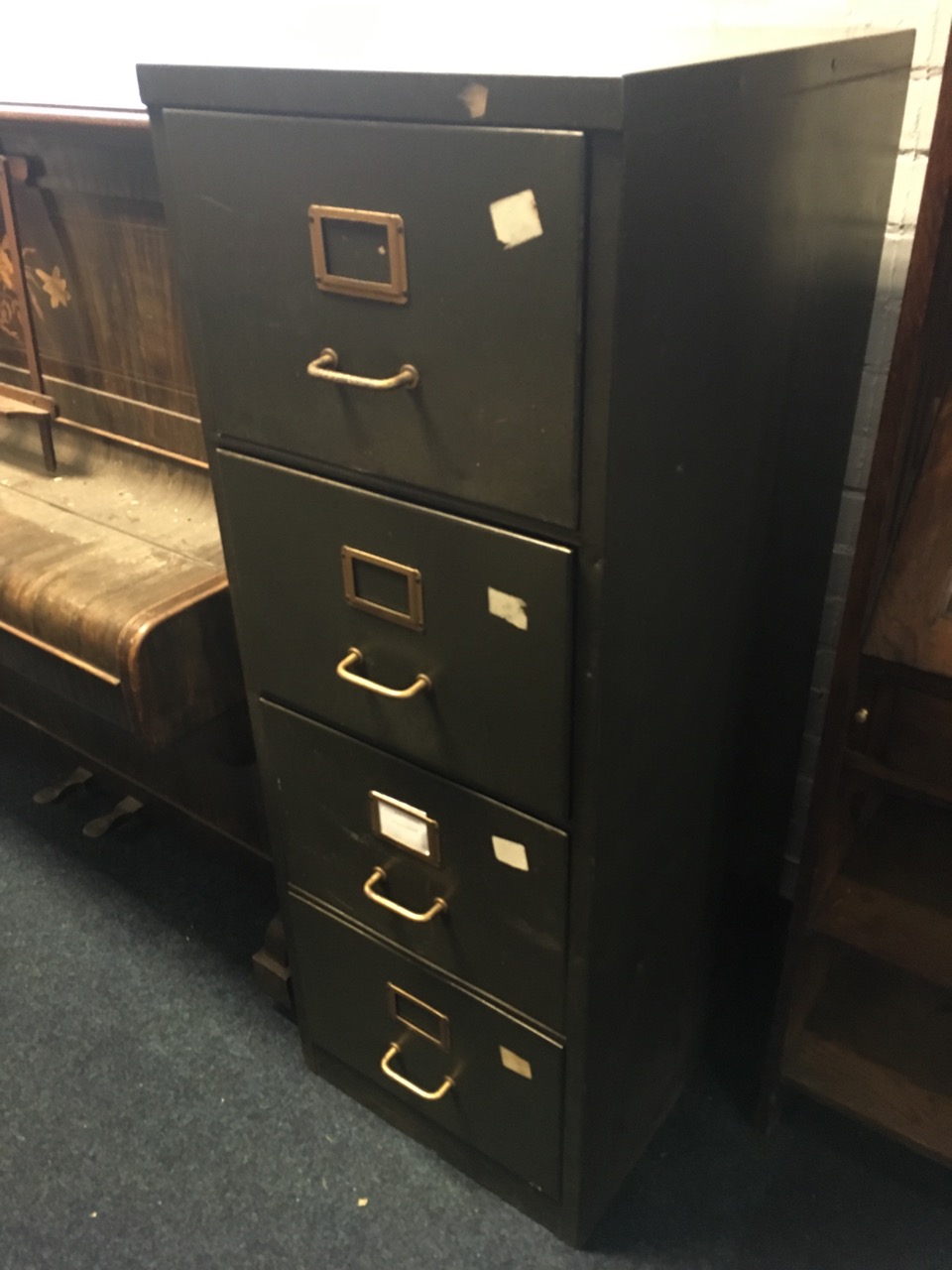 A metal filing cabinet with four drawers mounted with tubular handles. - Image 2 of 3