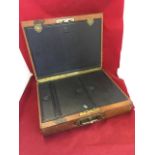 A late Victorian leather mounted writing box, the fitted interior with compartments, inkwell,