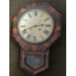 A Victorian rosewood drop-dial wallclock, the dial with roman chapters in octagonal frame with brass