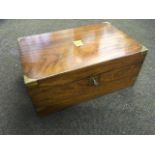 A Victorian walnut writing box, the slope with brass mounts having fitted interior with pen tray,