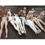 A collection of mannequin figures, girls & boys, some just bust torsos, loose arms, hands & legs,