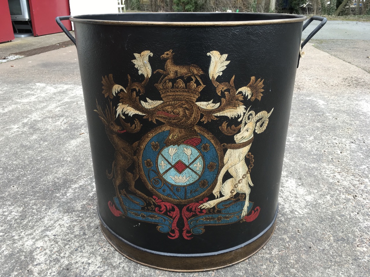 A large tubular log bin, the tub with handles and rolled rim decorated with armorial stye crest. ( - Image 3 of 6